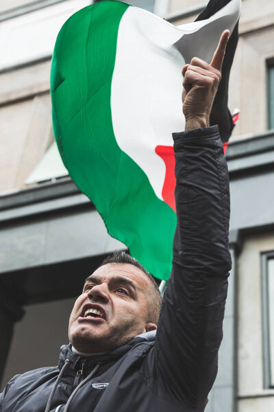 Pro-Palestinian demonstrator contesting the Jewish Brigade