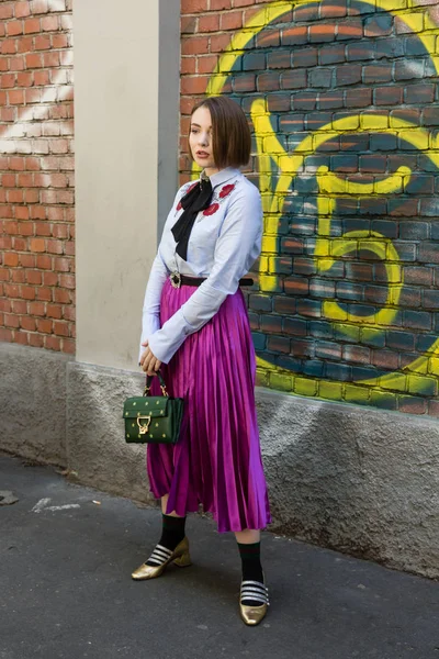 Fashionable woman posing during Milan Women 's Fashion Week — стоковое фото