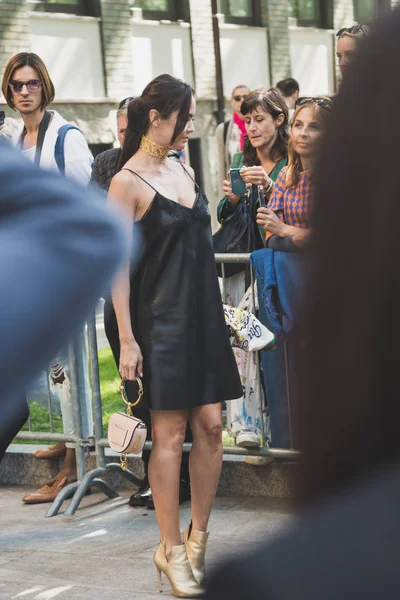 Fashionable woman posing during Milan Women 's Fashion Week — стоковое фото