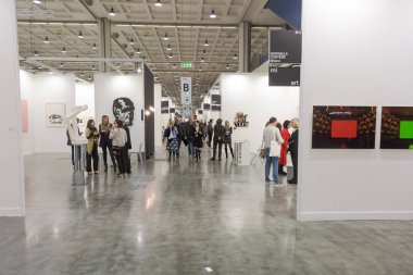 People visiting Miart 2018 in Milan, Italy clipart
