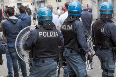 Riot police during a demonstration in Milan, Italy clipart