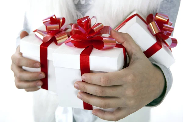 Gift boxes in the children's hands — Stock Photo, Image