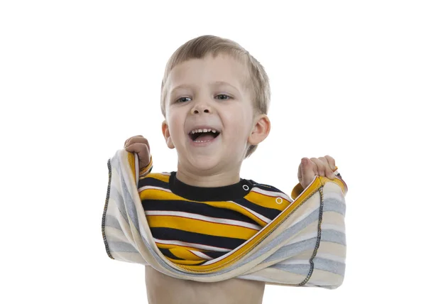 Çizgili bir gömlek duran küçük çocuk — Stok fotoğraf