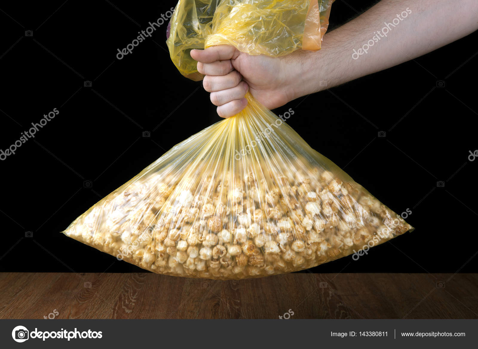 depositphotos_143380811-stock-photo-hand-holding-a-plastic-bag.jpg