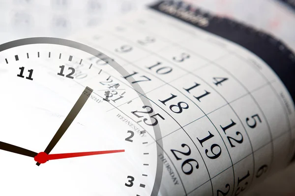 Wall calendar with the number of days and clock — Stock Photo, Image