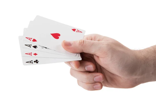 Fan de cartes à jouer as en main sur fond blanc — Photo