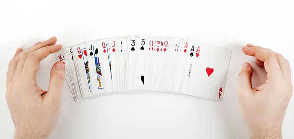 Duże talię kart w postaci wentylatora na stole i grać — Zdjęcie stockowe