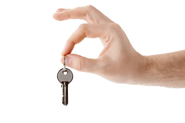 Ключі від квартири в долоні людини — стокове фото