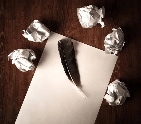 Still life of paper and a crumpled paper on a table with a pen — Stock Photo, Image