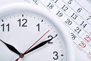 Saat yüzü ve takvim sayfa numaraları ile