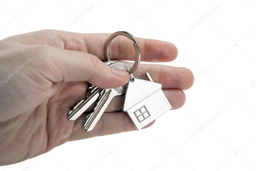 keys of an apartment in the palm of a person