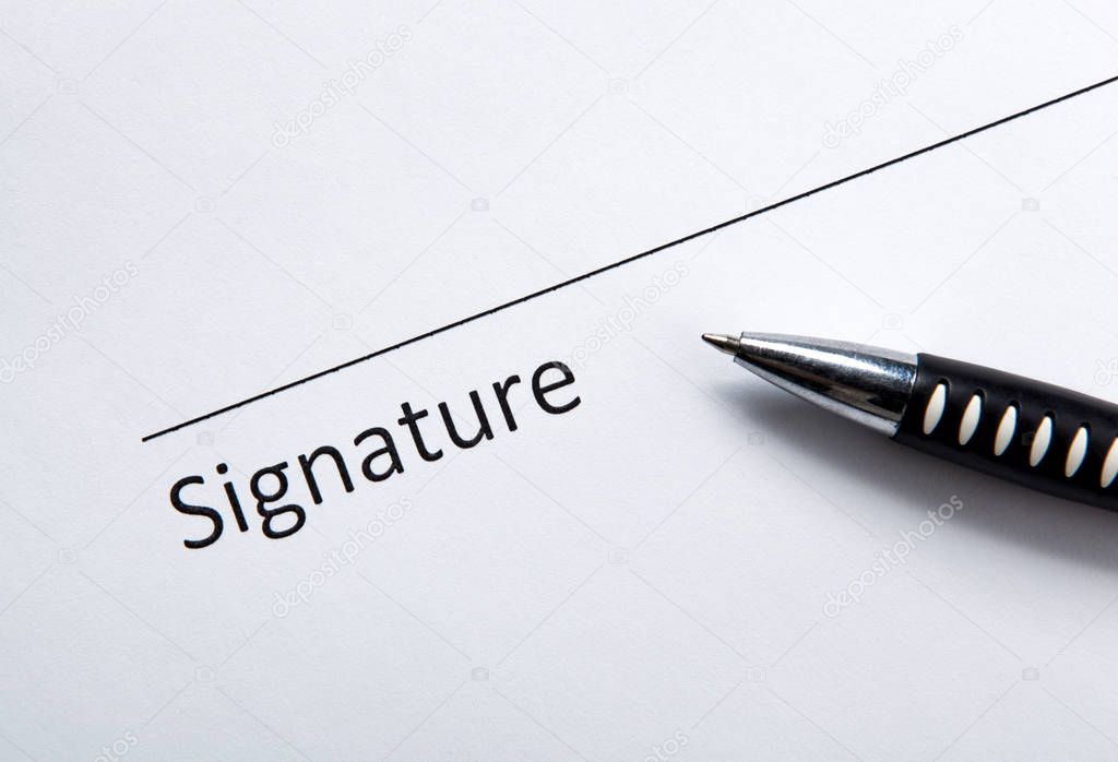 One document with a place for a signature and a pen