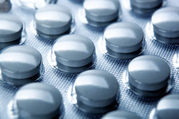 Pills in a plate as a medicine close up — Stock Photo, Image