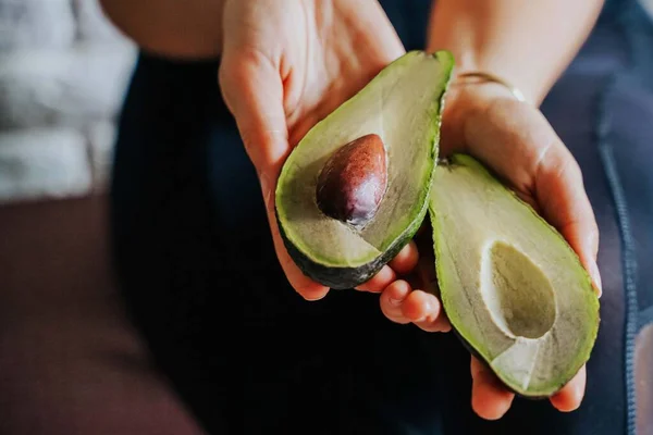 Woman Holding Avocado Her Hands Space Text — Stock Photo, Image