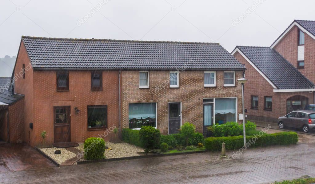 village houses during rainy weather in Rucphen, a small village in the Netherlands