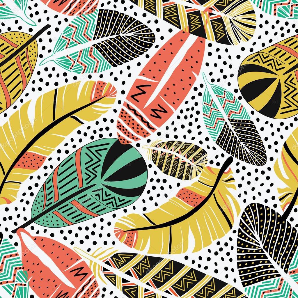 Vector seamless pattern with ethnic ornate colorful feathers.