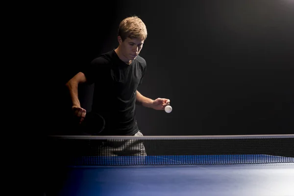 Portrait of young man playing tennis — Stock Photo, Image