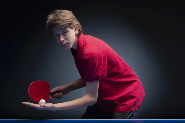 Portrait of young boy playing tennis — Stock Photo, Image