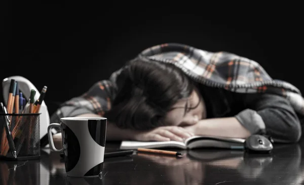 Female student sleeping with books at her desk. — 스톡 사진