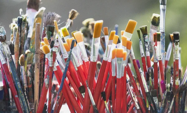 Lot Dirty Artist Paint Brushes Bucket Different Artist Brushes Close — Stock Photo, Image