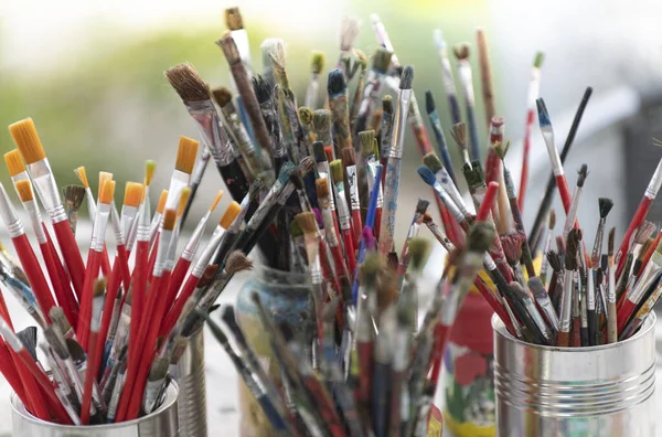 Lot Dirty Artist Paint Brushes Bucket Different Artist Brushes Close — Stock Photo, Image