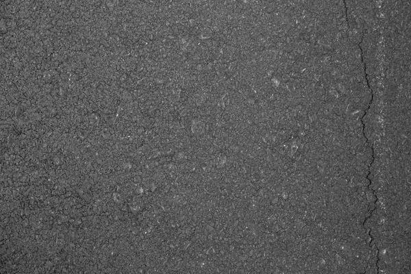Textura de fundo de asfalto com algum grão fino com estrada — Fotografia de Stock