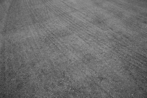 Асфальтовая текстура с мелким зерном на дороге — стоковое фото