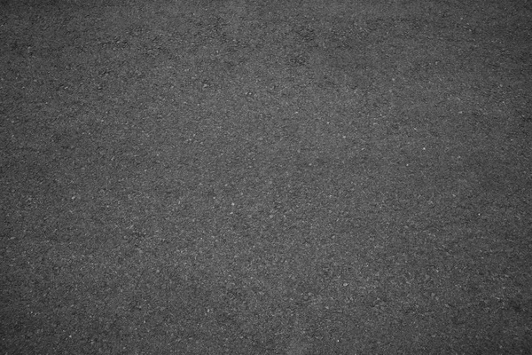 Asphalt background texture with some fine grain with road — Stock Photo, Image