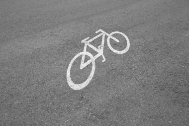 Asfalt arka plan dokusu ile bisiklet yolu ile bazı ince taneli