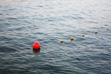Adriatic sea with buoy balls. clipart