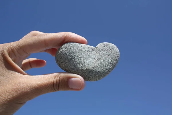 heart stone in the hand