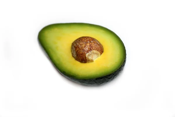 Половина Авокадо Семенем Белом Фоне — стоковое фото