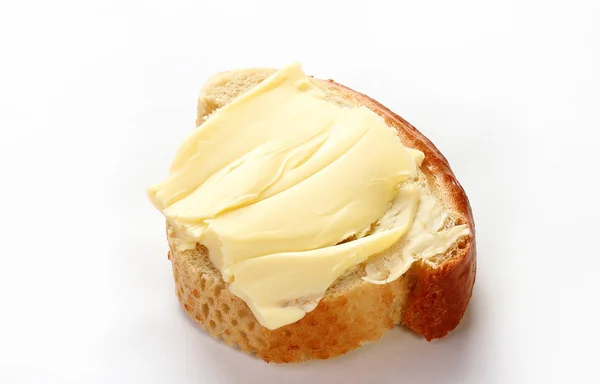 奶油与面包隔离的白色背景 — 图库照片