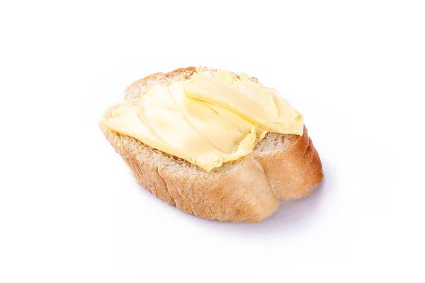Manteiga com pão isolado sobre fundo branco — Fotografia de Stock