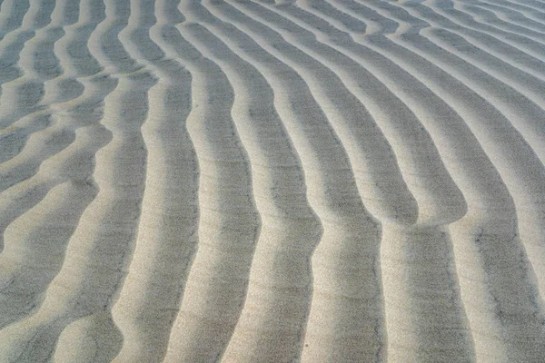 Woestijn zandduinen kunstwerk textuur achtergrond — Stockfoto