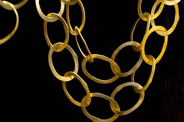 Gold chain isolated on black — Stock Photo, Image