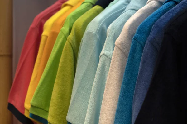 Short sleeves polo shirt on display stand — Stock Photo, Image