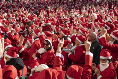 GENOA, ITALY - DECEMBER 22 2019 - Traditional Santa claus walk
