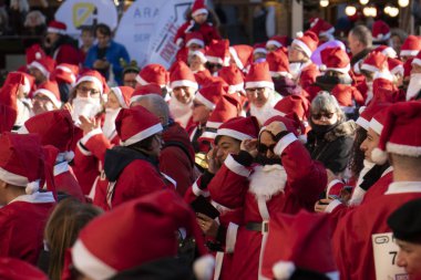 GENOA, ITALY - DECEMBER 22 2019 - Traditional Santa claus walk