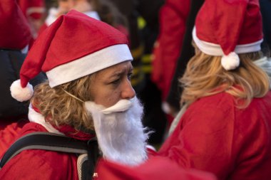 GENOA, ITALY - DECEMBER 22 2019 - Traditional Santa claus walk