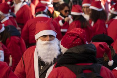 GENOA, ITALY - DECEMBER 22 2019 - Traditional Santa claus walk