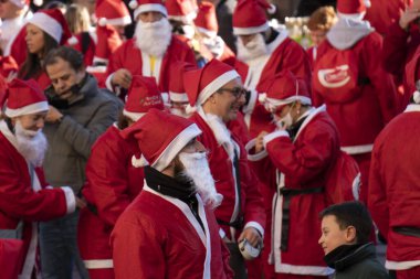 GENOA, ITALY - DECEMBER 22 2019 - Traditional Santa claus walk