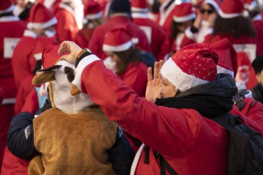 GENOA, ITALY - DECEMBER 22 2019 - Traditional Santa claus walk