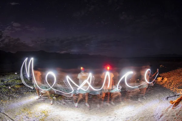 Mexiko glöd ljus målning skriva på stranden — Stockfoto