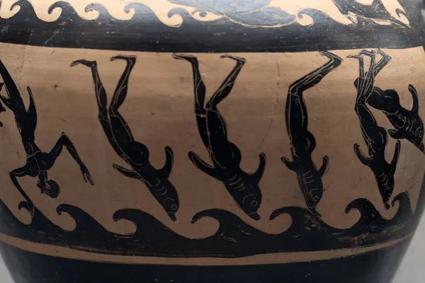 Zwemmer morphing naar dolfijn Griekse vaas — Stockfoto