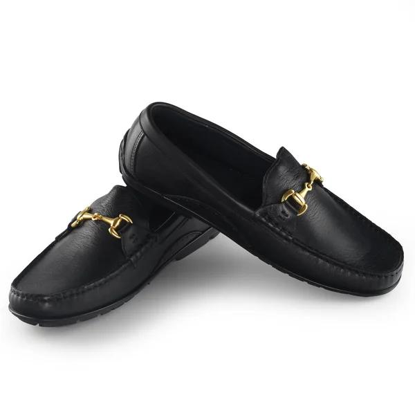 Siyah deri ayakkabılar giymiş bir çift erkek giysisi.