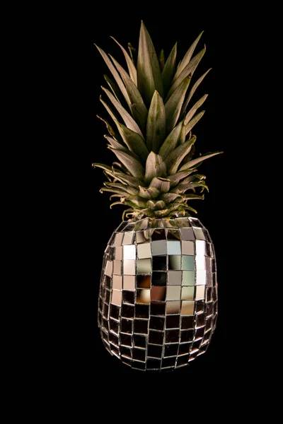 Discoball pineapple on a black background