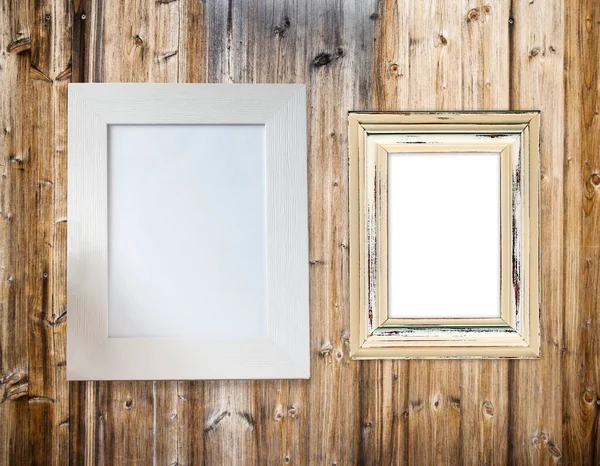 White frame and old frame on wooden wall background, mockup