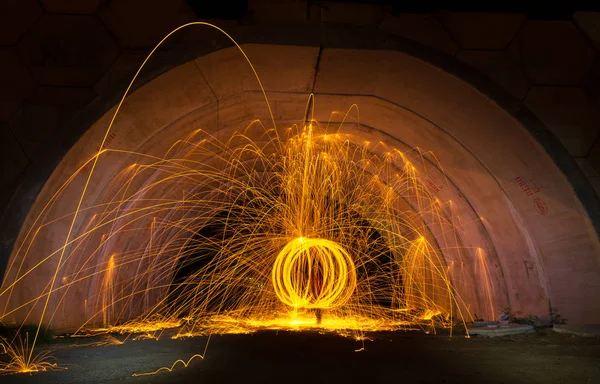 Fire spark from steel wool in tunnel Stock Photo