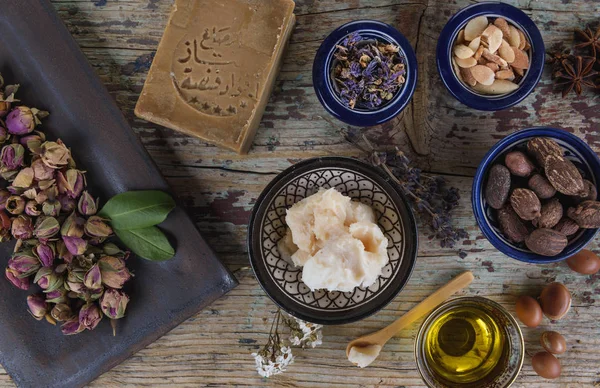 Mix of nuts and herbal, Aleppo soap and shea butter — Stock Photo, Image